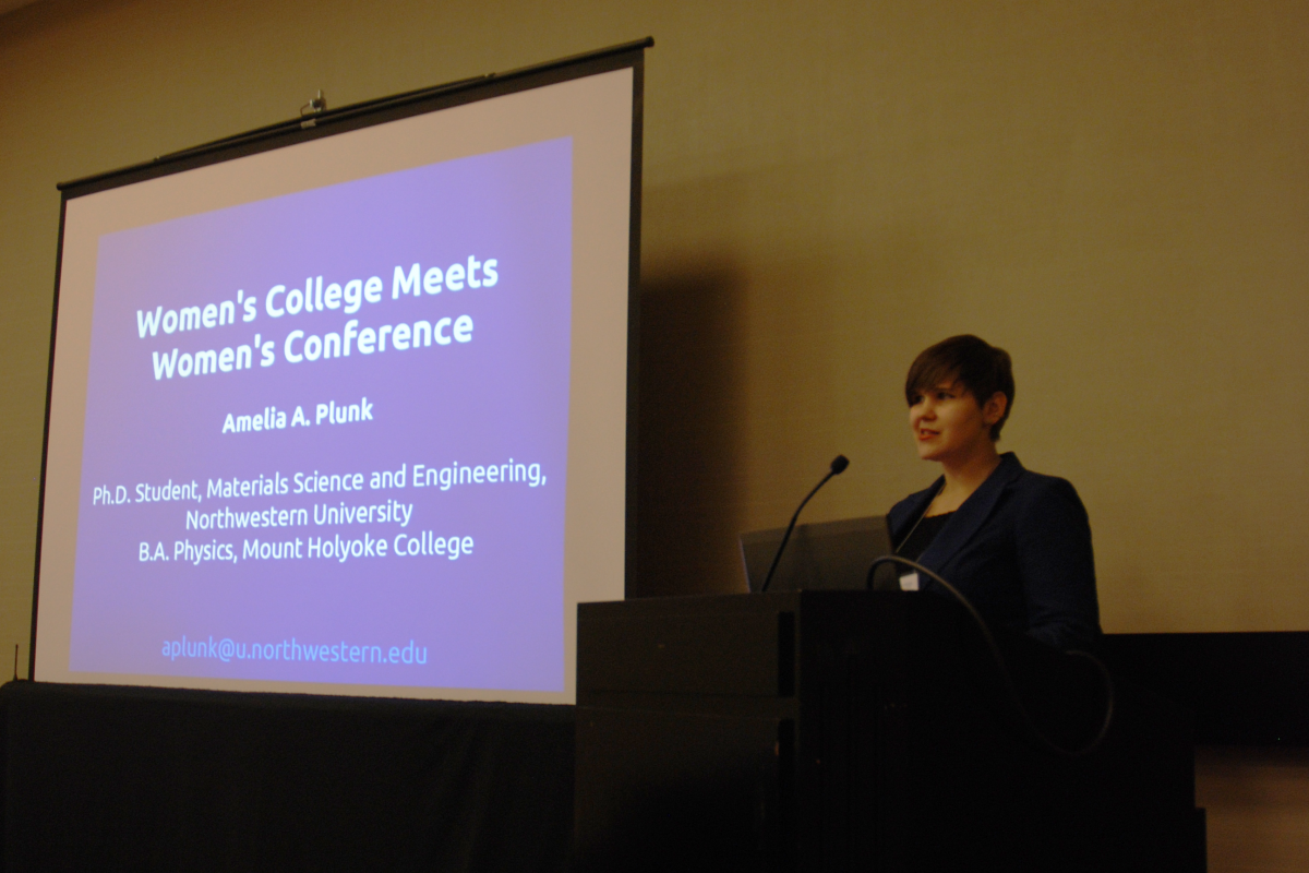 SPS Reporter Amelia Plunk gives an invited presentation during the panel on the Conference for Undergraduate Women in Physics. Photo courtesy of Ariel Ekblaw