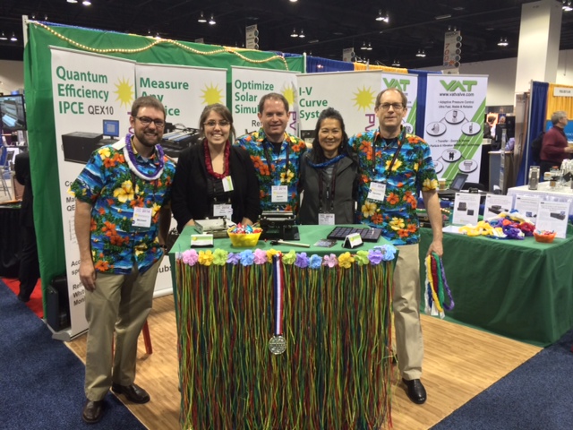 Warecki in the exhibit hall with exhibits and classmate  Kyle Sherbert (right).