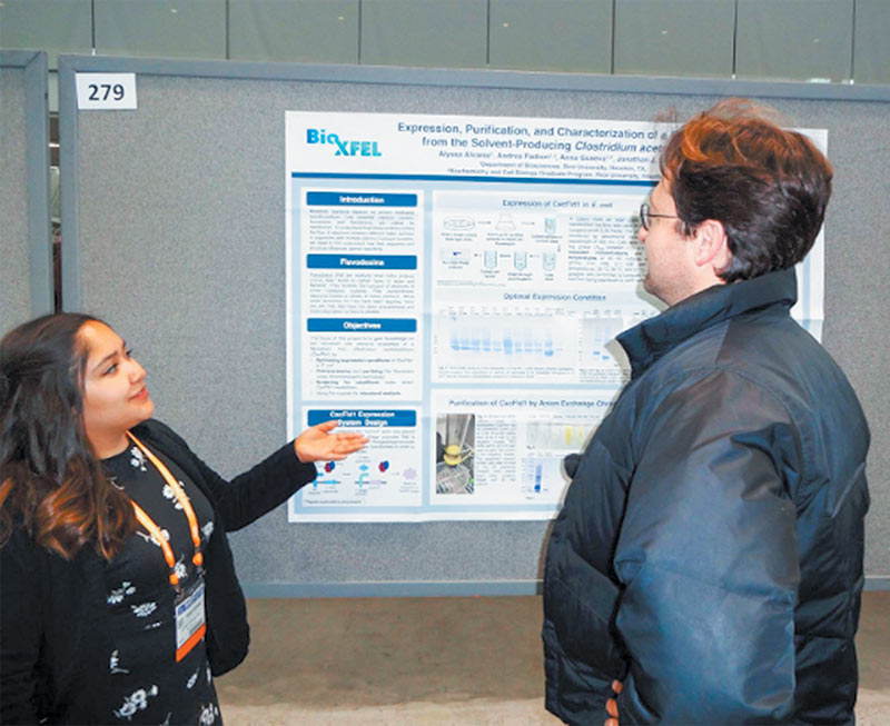 Alyssa Alvarez presenting her poster at the APS March Meeting undergraduate poster session. Photo courtesy of Alyssa Alvarez.