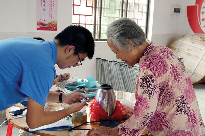 Villagers brought a variety of electrical appliances to the event, including electric tea kettles, rice cookers, and DVD players.