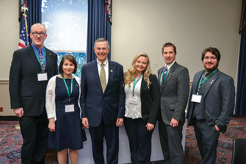 SPS student leaders with then US Representative Rush Holt (D-NJ), third from left, during a 2014 visit to Capitol Hill. Photo by SPS National.