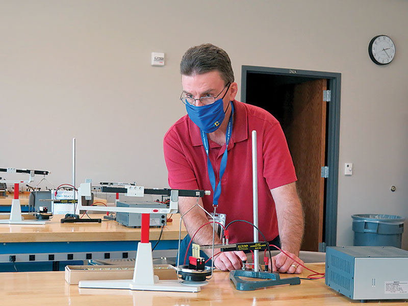 McTaggart prepares for class. Photo courtesy of South Dakota State University.