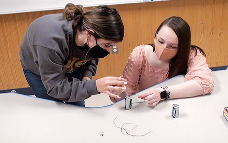 A&amp;M-Commerce SPS president Keely Scott (left) and vice&nbsp;president Madison Smith perform demonstrations with liquid nitrogen (2) and circuits (3).