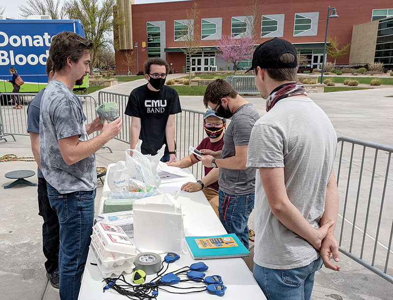 Members of Colorado Mesa University’s SPS chapter prepare for an outreach event.