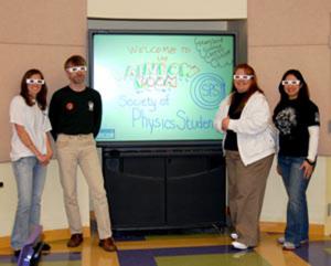 Left to right- Kristin Peterson, Earl Blodgett (SPS President), Toni Sauncy (Angelo State SPS Advisor), and Meagan Saluda, participants in the &quot;SPS Rainbow Room&quot; outreach event at the Maryland Science Center during the 2008 AAPT Winter Meeting.