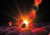 This illustration shows atoms forming a tentative bond, a moment captured for the first time in experiments with an X-ray laser at SLAC National Accelerator Laboratory.