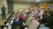 Dr. Tony Gherghetta leading a discussion after a screening of Particle Fever