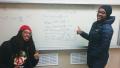 Travante Thompson (left) and Donielle Miller working on E&M as CSU physics students. Photo by Mel Sabella.