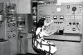 An unidentified member of the National Bureau of Standards Mass Spectrometry Division in 1948 using a mass spectrometer. The mass spectrometer ionized gas at extremely low pressure and measured the mass of the resulting ions. Molecules were identified by their molecular weight and by the molecular weights of their dissociation products. Photo credit: National Institute of Standards and Technology Digital Archives, Gaithersburg, MD.