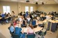 Another initiative resulting from physics education research (PER) is to change the setup of physics classrooms from traditional lecture halls to studio-style classrooms to facilitate teamwork and allow instructors to move between groups. This is called SCALE-UP, a Student-Centered Active Learning Environment for Undergraduate Programs. Image courtesy of Florida State University.
