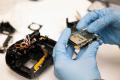 A photo of the disassembled camera and the chip that was installed in it 