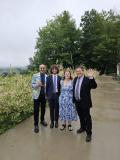 My dads, older sister, and me at the wedding