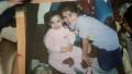 Me when I was 5 years old with my new born little sister
